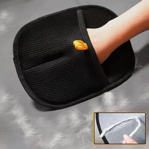 Pet grooming glove for shedding dogs and cats gently removing loose fur from a golden retriever’s coat